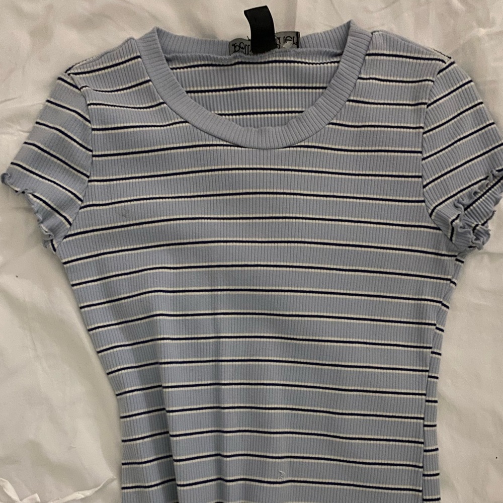 Blue top with ruffle shoulders and bottom